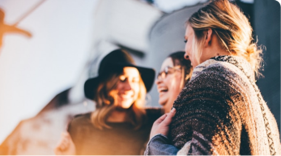 people laughing in the sun